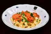 Egg yolk pasta with lemon sauce with spring peas and our marinated salmon